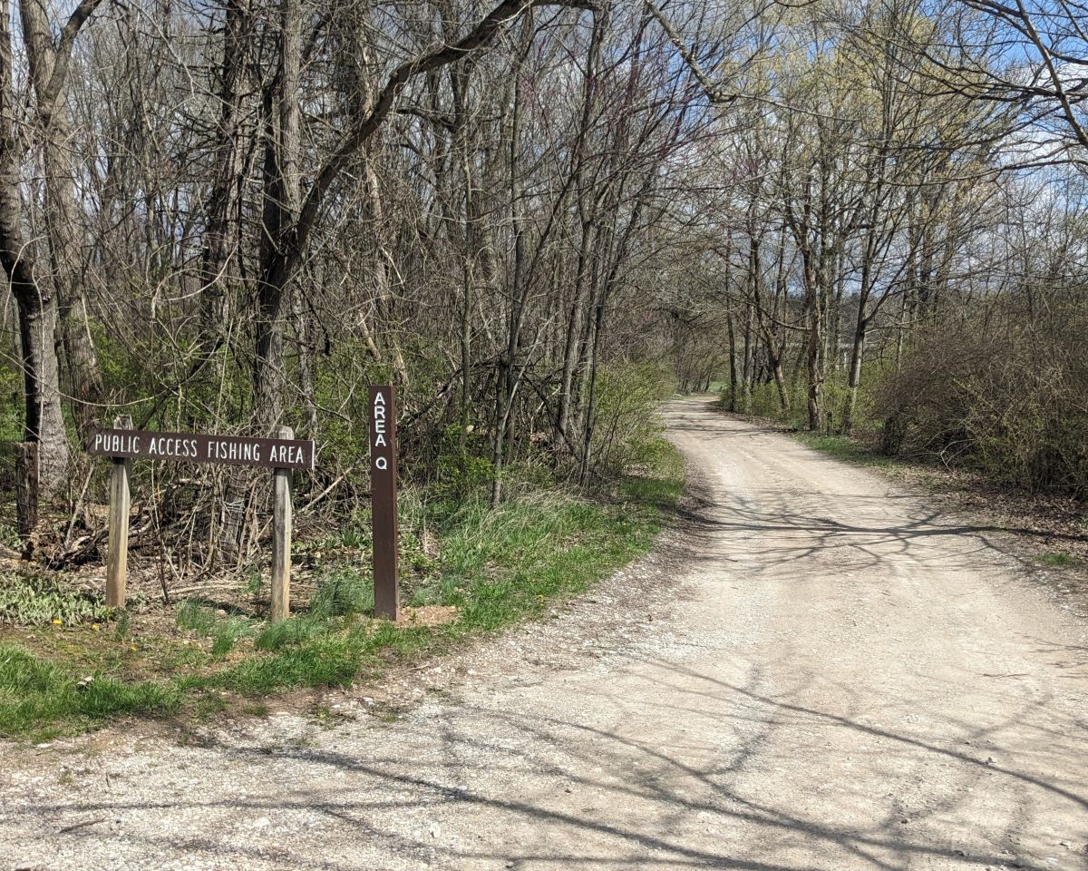 Point Park entrance with signs and gravel road
